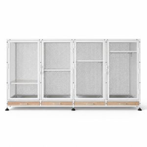 Commercial animal cages project view showing a four-compartment perforated metal housing cabinet from the front